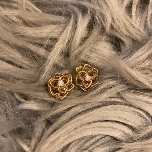 Gold floral earrings with CZ stone in the center